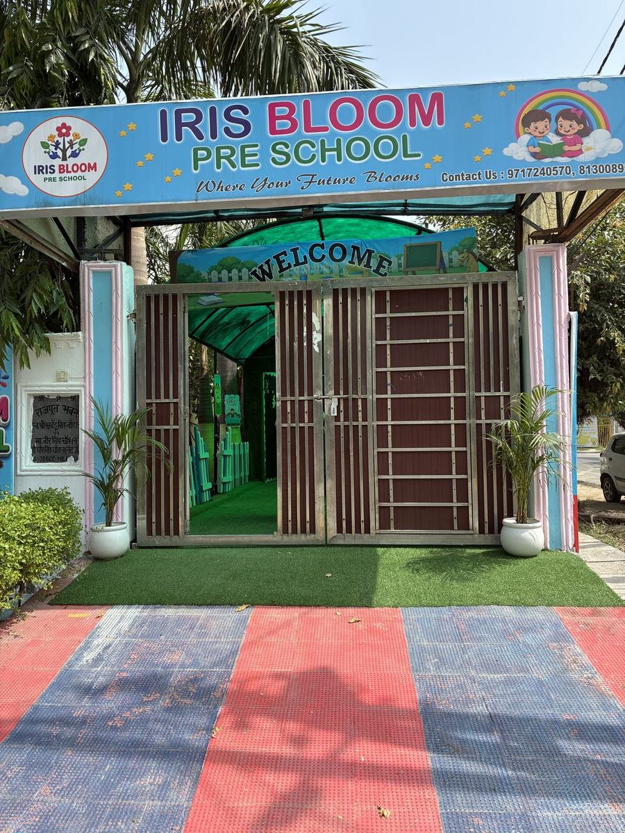 The Iris Bloom Preschool entrance gate in Sector 116, Noida, with the school's signage and logo